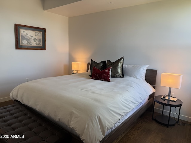 200 W Portland St Unit 1222, Phoenix, AZ 85003 - bedroom featuring wood finished floors and baseboards