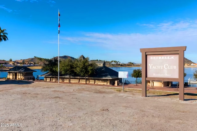 view of home's community with a water view