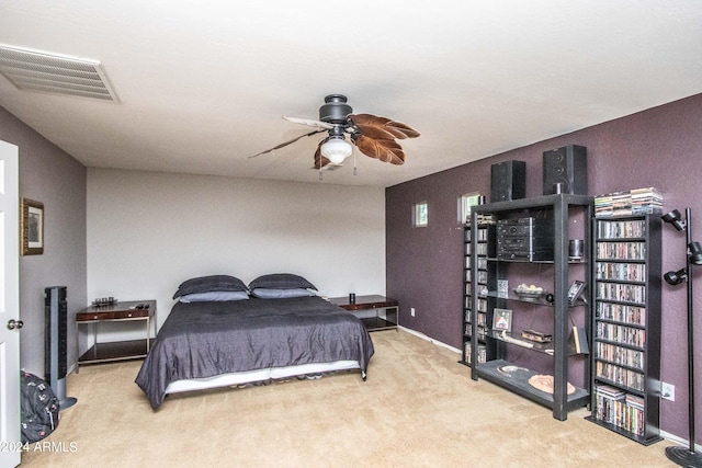 bedroom featuring ceiling fan and light colored carpet