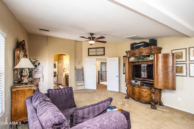 living room with light carpet and ceiling fan