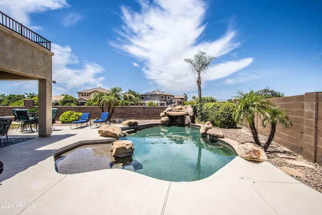 view of pool featuring a patio