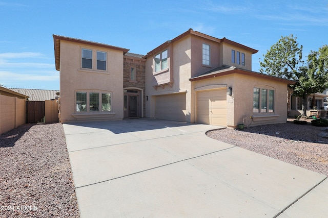 view of front of property with a garage