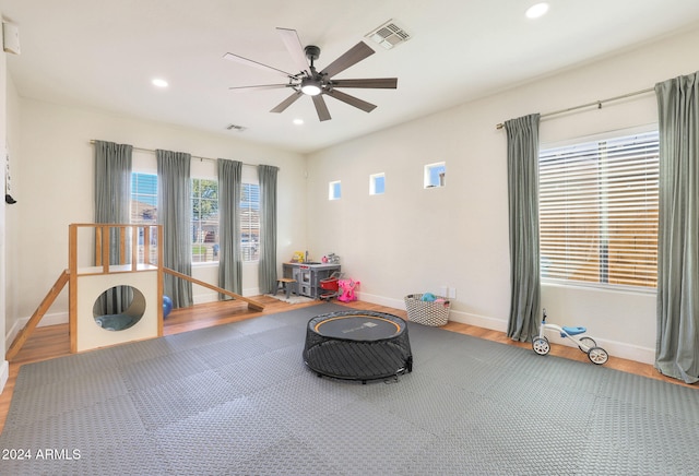 unfurnished room featuring ceiling fan and hardwood / wood-style flooring