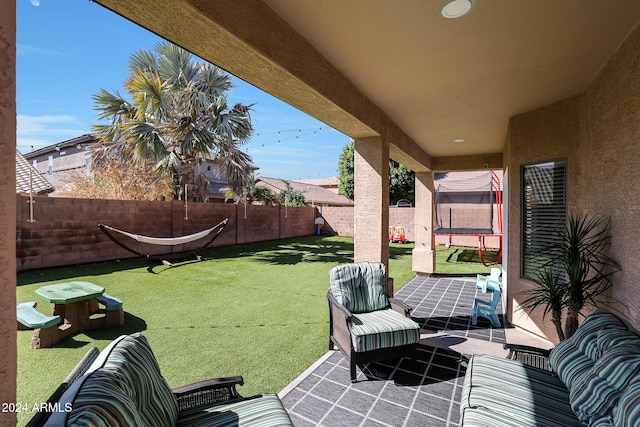 view of patio with a trampoline