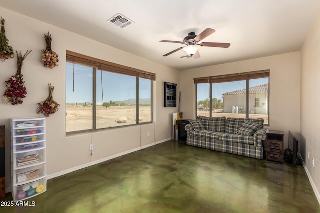 4621 S 179th Dr, Goodyear, AZ 85338 - living room with finished concrete flooring and a ceiling fan