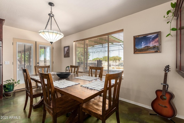 4621 S 179th Dr, Goodyear, AZ 85338 - dining space featuring concrete flooring and baseboards
