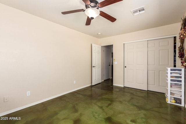 4621 S 179th Dr, Goodyear, AZ 85338 - unfurnished bedroom with finished concrete flooring, a closet, and ceiling fan
