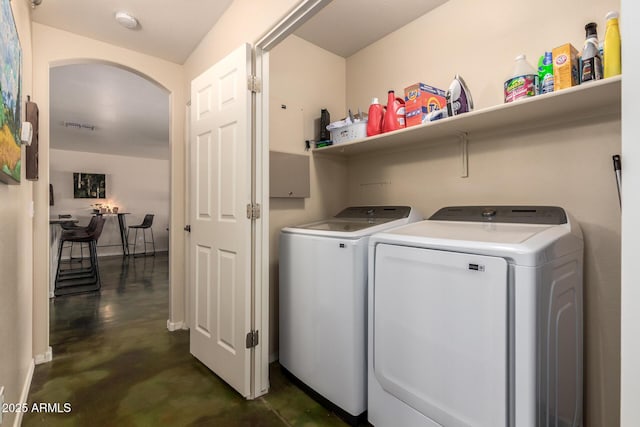 4621 S 179th Dr, Goodyear, AZ 85338 - washroom featuring separate washer and dryer and arched walkways