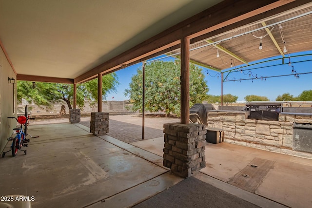 4621 S 179th Dr, Goodyear, AZ 85338 - fenced backyard featuring exterior kitchen and a patio