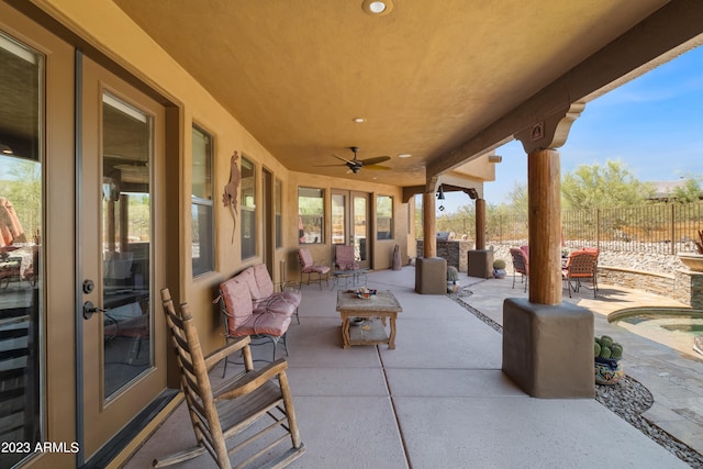 view of patio with ceiling fan