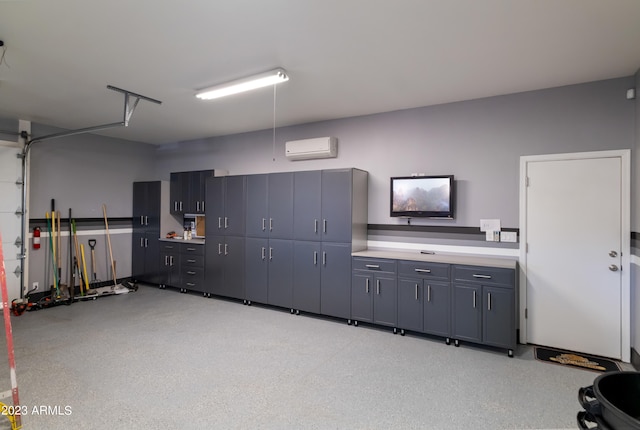 garage featuring an AC wall unit