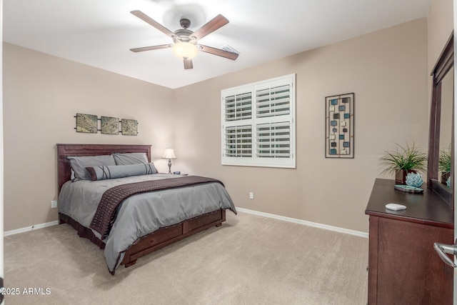 bedroom featuring carpet, baseboards, and ceiling fan