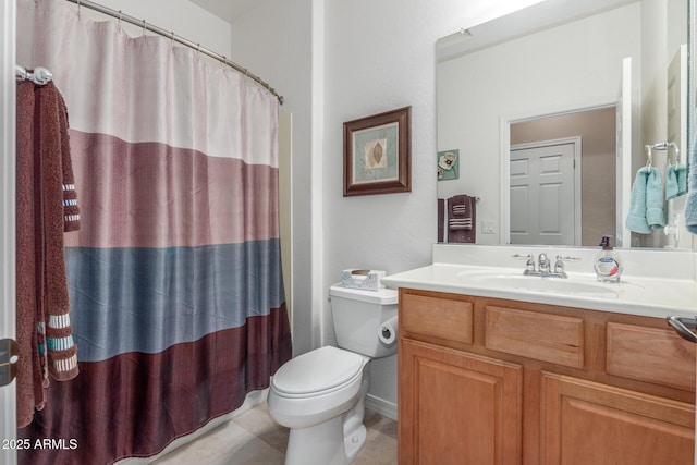 bathroom featuring tile patterned floors, a shower with curtain, toilet, and vanity