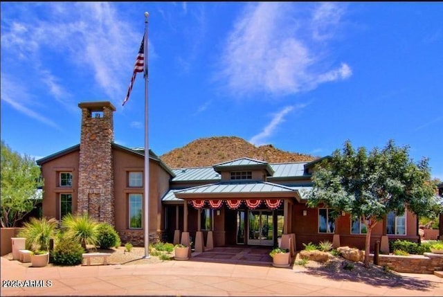 view of building exterior with a mountain view