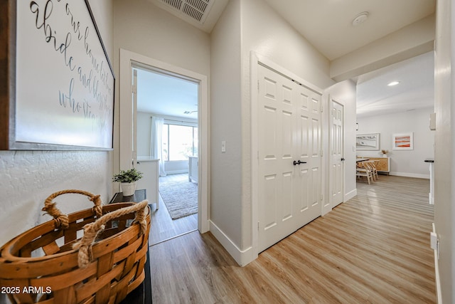 hall featuring light hardwood / wood-style flooring