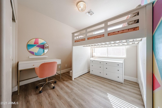 office space featuring light wood-type flooring