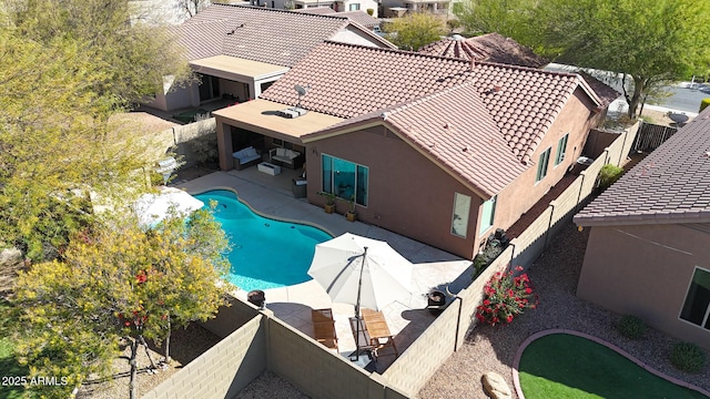 view of swimming pool featuring a patio