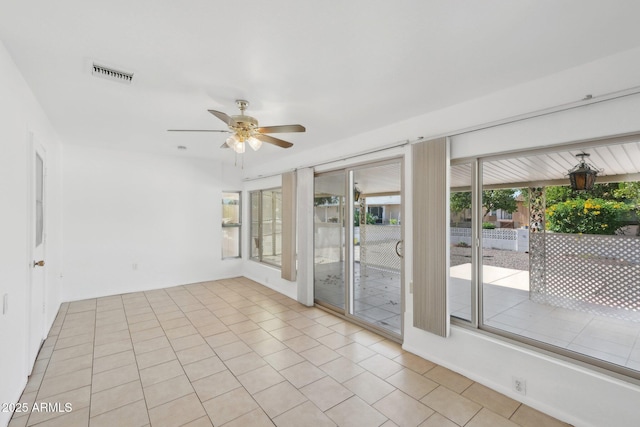 11044 W Cheryl Dr, Sun City, AZ 85351 - empty room featuring a ceiling fan and light tile patterned floors