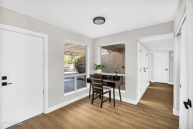 25810 S Boxwood Dr, Sun Lakes, AZ 85248 - dining room featuring wood finished floors and baseboards
