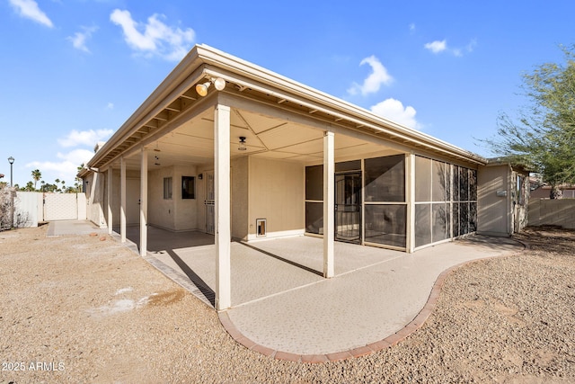 25810 S Boxwood Dr, Sun Lakes, AZ 85248 - back of house featuring a patio and a sunroom