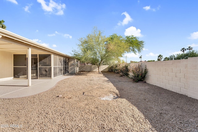 25810 S Boxwood Dr, Sun Lakes, AZ 85248 - fenced backyard featuring a sunroom and a patio