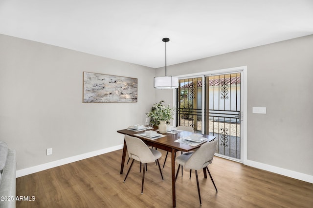 25810 S Boxwood Dr, Sun Lakes, AZ 85248 - dining area featuring baseboards and wood finished floors