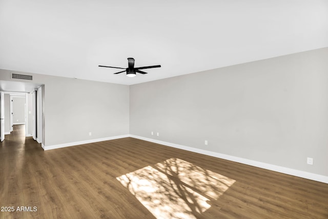 25810 S Boxwood Dr, Sun Lakes, AZ 85248 - spare room with baseboards, ceiling fan, and dark wood-type flooring
