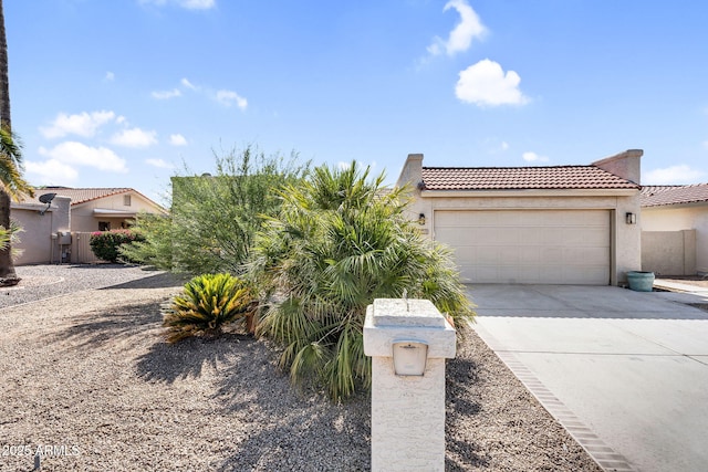 25810 S Boxwood Dr, Sun Lakes, AZ 85248 - view of front facade with driveway, a tile roof, a garage, and stucco siding