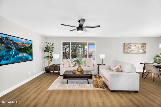 25810 S Boxwood Dr, Sun Lakes, AZ 85248 - living room featuring wood finished floors, baseboards, and a ceiling fan