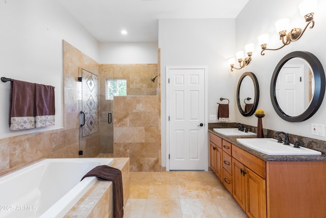 full bath featuring a bath, double vanity, tiled shower, and a sink