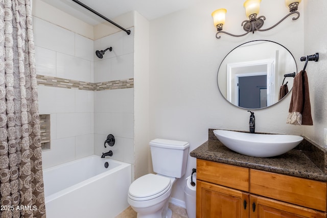 bathroom with toilet, vanity, and shower / bath combo