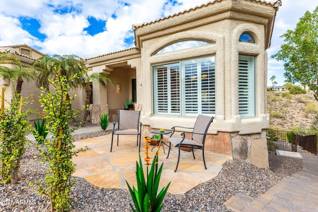 view of patio with fence