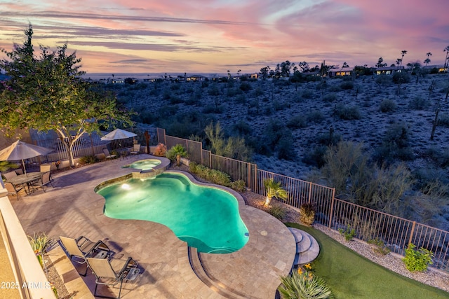 view of swimming pool with a gazebo, a patio area, a fenced backyard, and a pool with connected hot tub