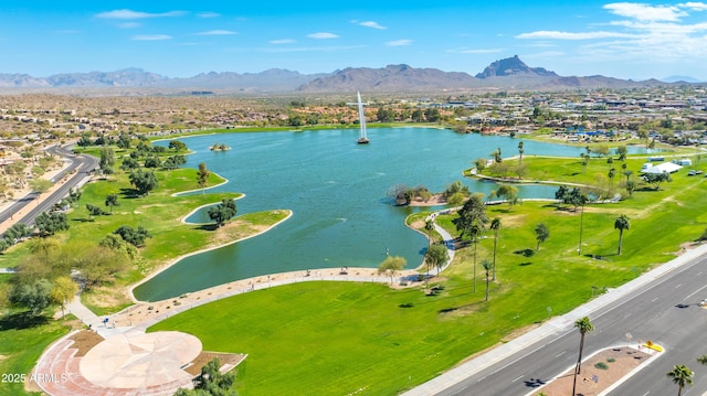 birds eye view of property featuring a water and mountain view