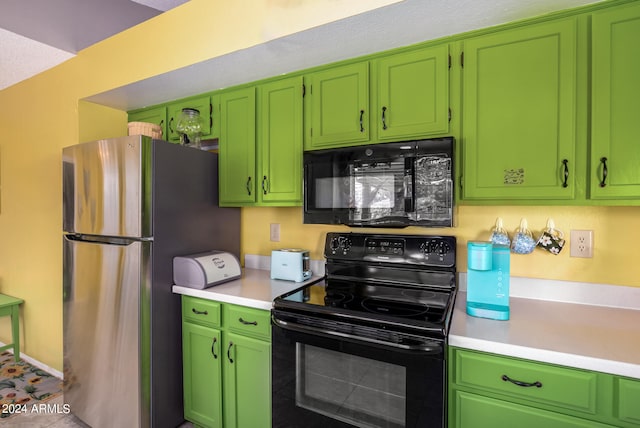 kitchen featuring black appliances, a textured ceiling, tile patterned floors, and green cabinetry