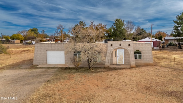 view of front of house with a garage