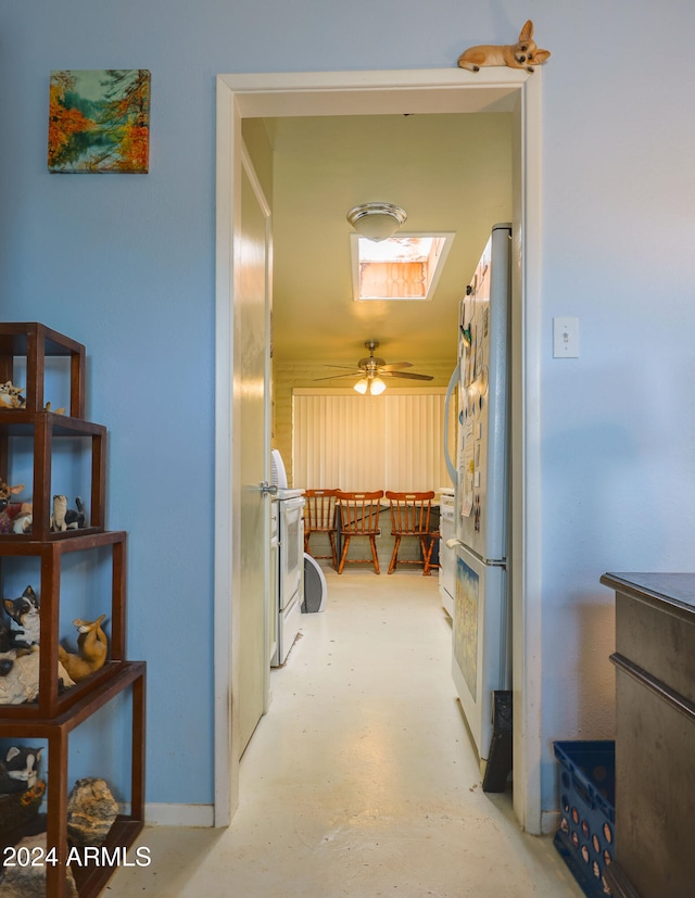 hallway with a skylight