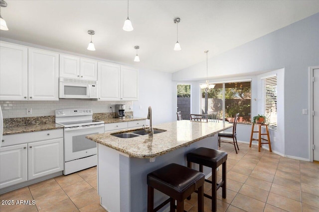 kitchen with white cabinetry, sink, lofted ceiling, decorative light fixtures, and white appliances