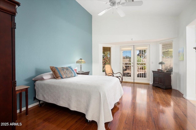 bedroom with hardwood / wood-style flooring, ceiling fan, and access to exterior