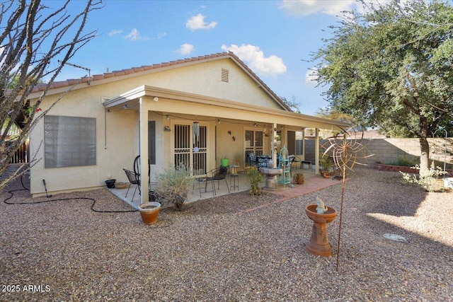 rear view of house with a patio area