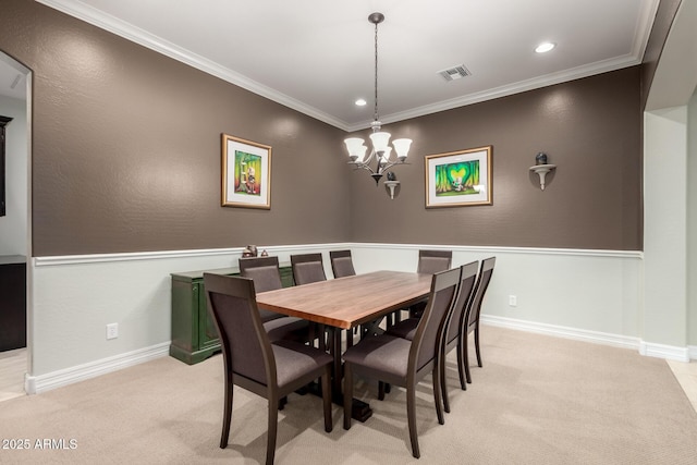 dining area featuring light carpet, ornamental molding, and visible vents