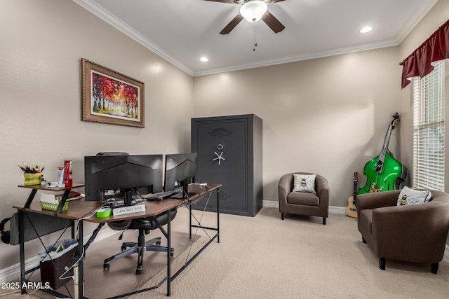 office area featuring light carpet, crown molding, baseboards, and ceiling fan
