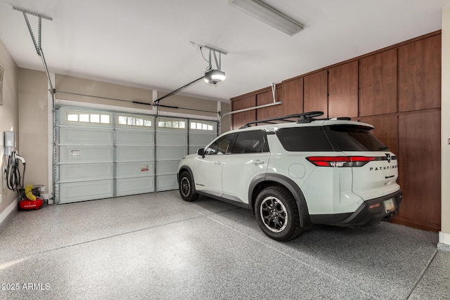 garage featuring a garage door opener