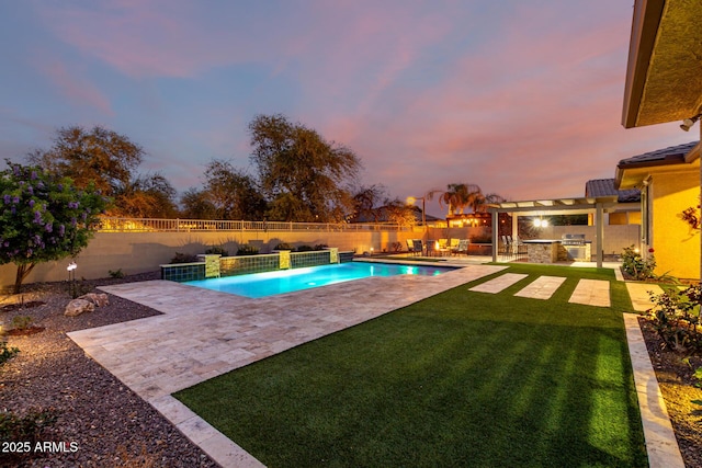 view of pool with a patio area, a fenced backyard, a fenced in pool, and a lawn
