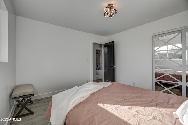 bedroom featuring hardwood / wood-style floors