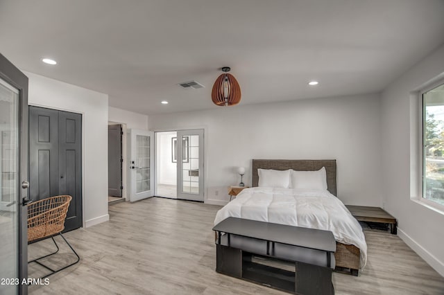 bedroom featuring light wood-type flooring