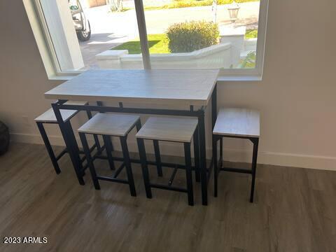 dining area featuring hardwood / wood-style flooring