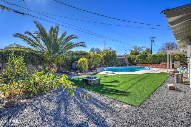 view of yard with a patio area and a fenced in pool