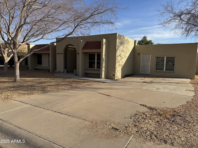 view of pueblo revival-style home