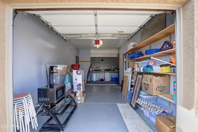 garage featuring a garage door opener